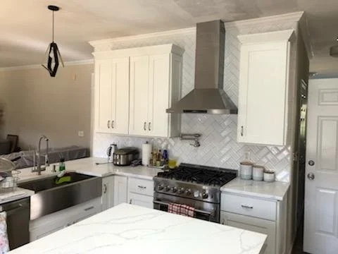 Kitchen update, Apex NC. Cabinet refacing, new backsplash, and hardware.