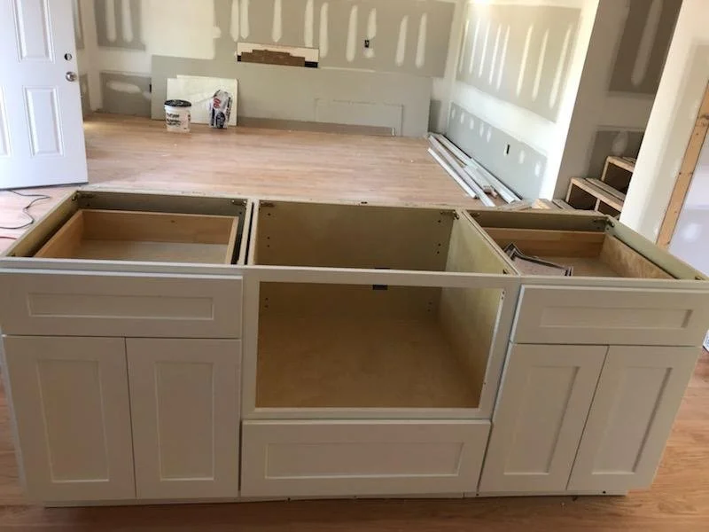 Kitchen remodel, Cary NC. Cabinet installation, countertop coordination, and finish work.